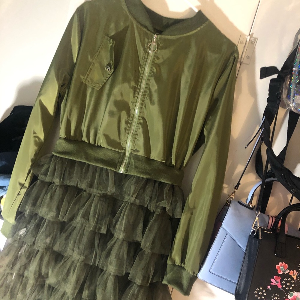 Olive green cropped wind breaker with long ruffle